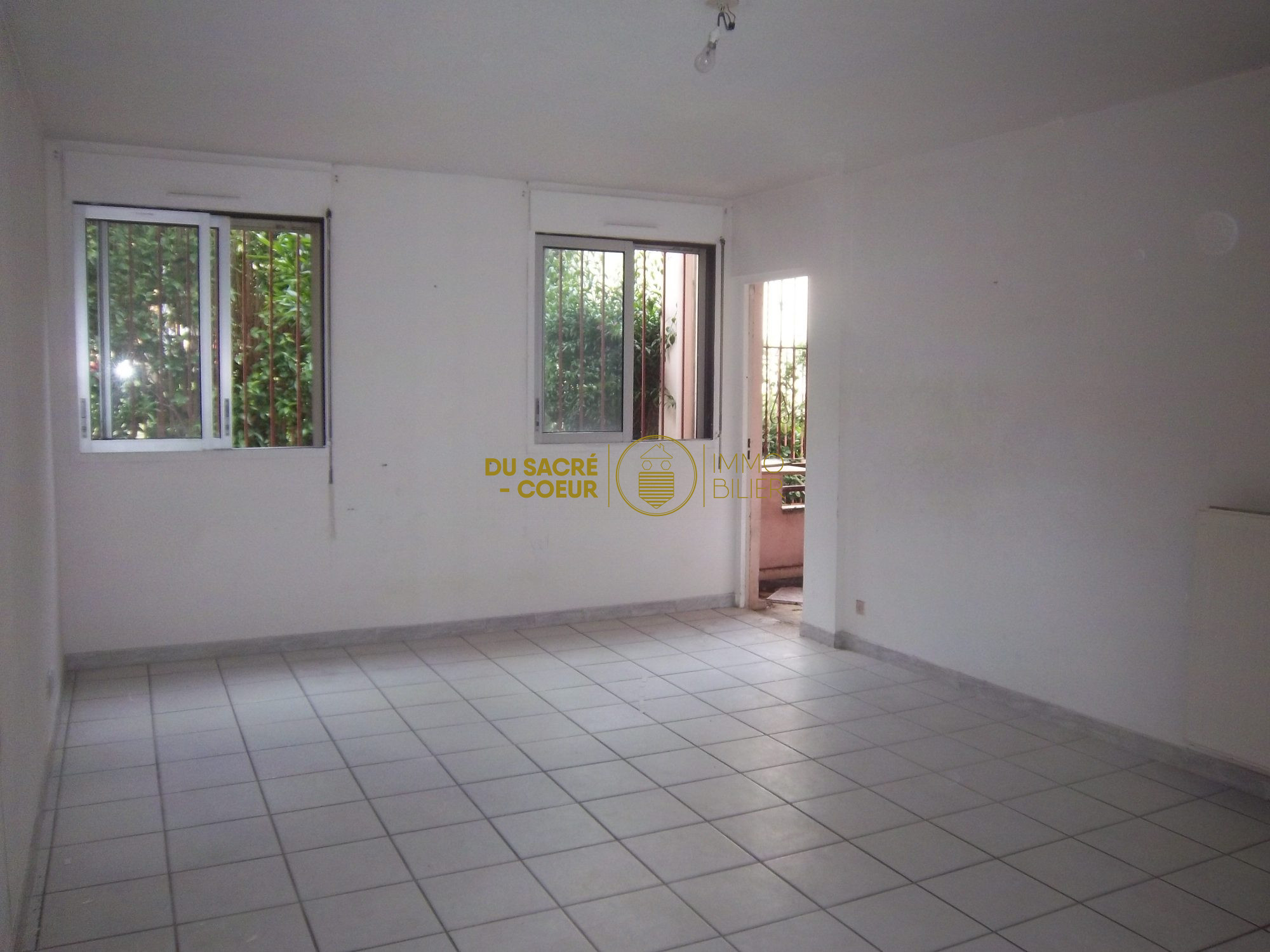 RDC APPARTEMENT T3 69M²73 + TERRASSE ET CAVE